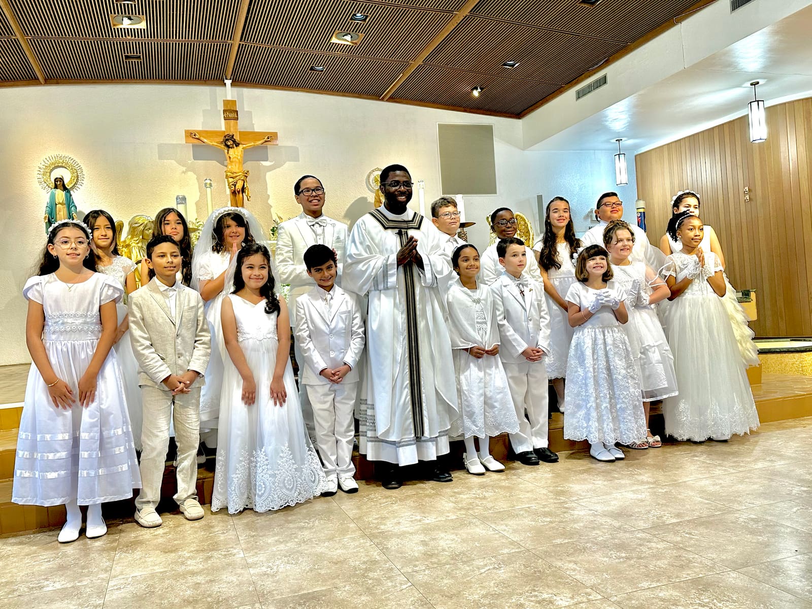 First Communion class with Fr. Cletus at St. Lawrence